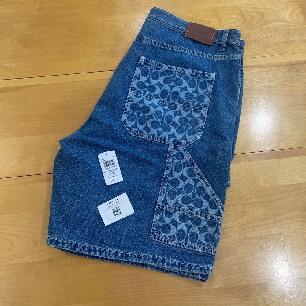 Coach signature monogram denim shorts.